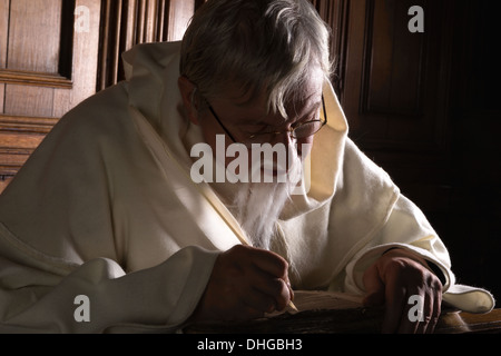 Bearded Old Man Writing with a Quill Pen Stock Photo - Alamy