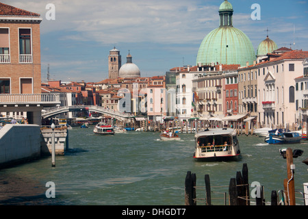 Vaporetto and boat traffic on Grand Canal looking towards San Simeone Piccolo and San Geremia churches Venice Veneto Italy Stock Photo