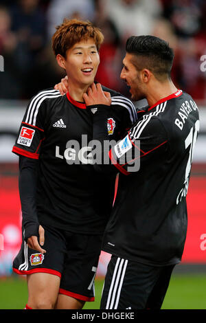 Leverkusen, Germany, 1st October, 2014. UEFA Champions League 2014/2015  Group stage Group C matchday 2, Bayer 04 Leverkusen (red) - Benfica  Lissabon (black) --- Heung-Min Son (Leverkusen) and Stefan Kie§ling  (Kiessling) (Leverkusen)