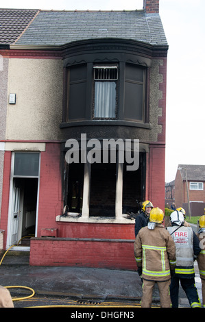 Severe house fire living room television accidental Stock Photo