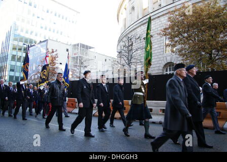 War Veterans march to the Cenotaph in Manchester UK to remember those who died in past wars and conflicts. Sunday November 10th 2013 Stock Photo