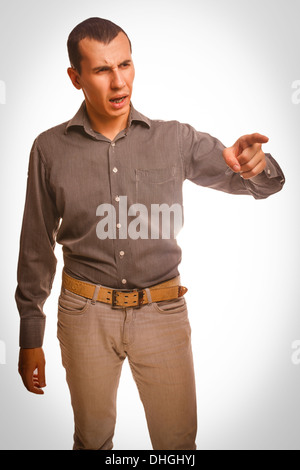 curse of an angry man swears points finger, family relations quarrel Stock Photo