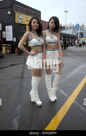 Macau Grand Prix girls pose in pit row Stock Photo