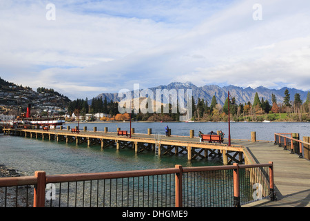 Waterfront boardwalk on bay in Lake Wakatipu, Queenstown, Otago, South Island, New Zealand. Stock Photo