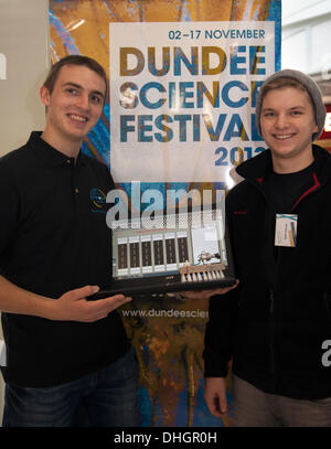Dundee, Scotland, UK.  9th November, 2013. Students Tim Webber, 19 and Robin Huennsse, 19 from Germany a group from Theodor Liitt Schule, German at the Dundee Science Festival a city-wide celebration of science, providing fun, entertainment, inspiration and curiosity for all ages. Visitors taking part in hands-on activities and learning and building and racing robot brushes. Stock Photo