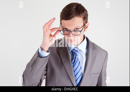 Portrait of handsome young businessman wearing glasses Stock Photo