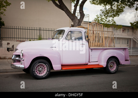 Vintage 1954 Chevrolet 3100 pickup truck parked on side of road - California USA Stock Photo