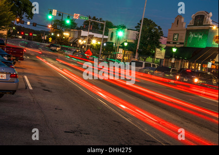 Taillights of early evening traffic at the town square in Lawrenceville, Georgia, on the outskirts of Atlanta. (USA) Stock Photo