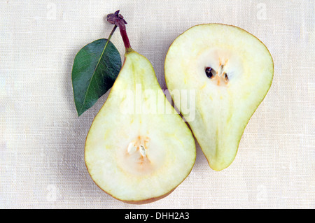 Two halves of pears on a white background Stock Photo