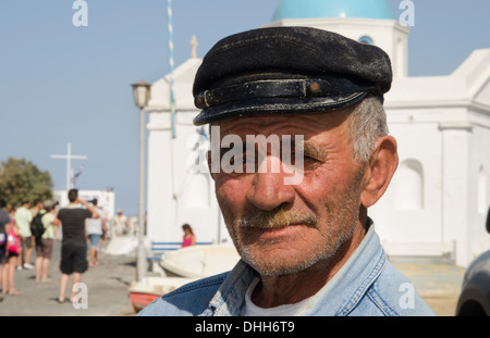 Mykonos Greece local man with fishing hat portrait with old greek