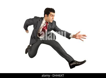 Business man jumping and running forward Stock Photo