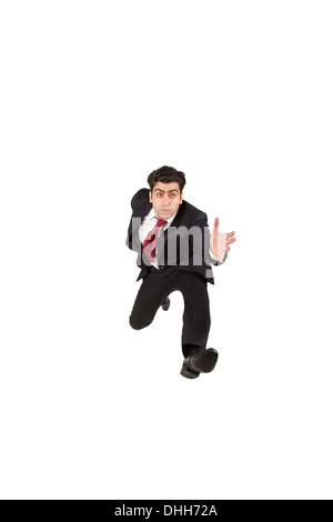 Business man jumping and running forward Stock Photo
