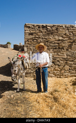 Greece Paros Cyclades old local man with donkey near Lefkes in mountains at his farm home 8 Stock Photo