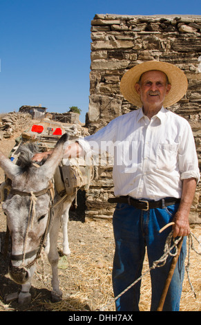 Greece Paros Cyclades old local man with donkey near Lefkes in mountains at his farm home 8 Stock Photo