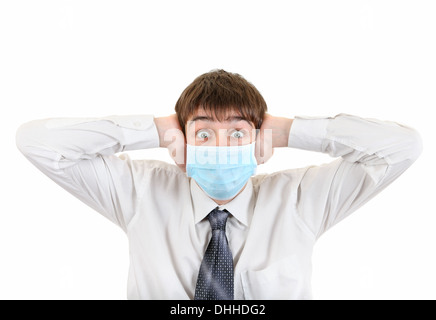 Shocked Young Man in Flu Mask Stock Photo