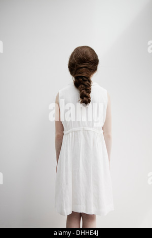 Girl with back facing camera Stock Photo