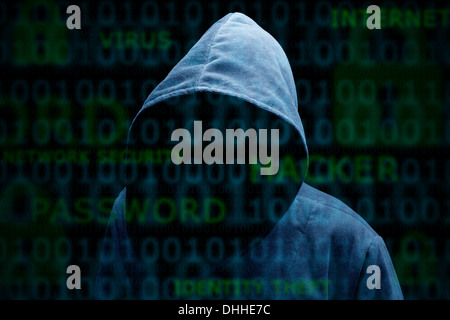 Hooded silhouette of a hacker Stock Photo