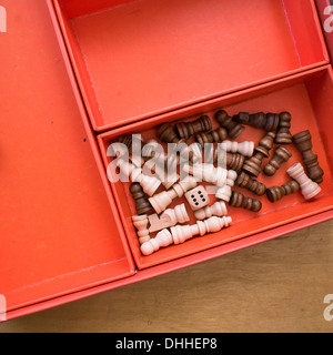 Close up of chess pieces in a wooden box Stock Photo