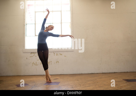 Female ballet dancer in studio Stock Photo