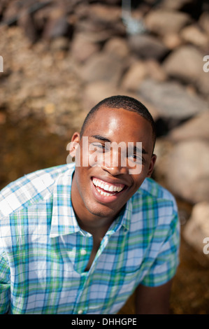 Portrait of young man wearing checked shirt Stock Photo