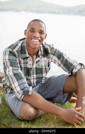 Portrait of young man wearing checked shirt Stock Photo