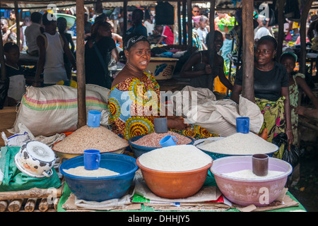 Grain seller at a street market, Bo, Southern Province, Sierra Leone Stock Photo