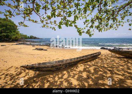 Dugout on the sandy beach, Banana Islands, Western Area, Sierra Leone Stock Photo