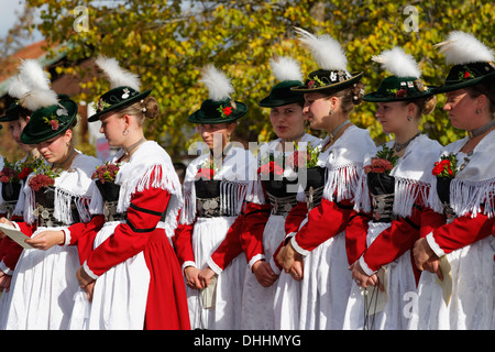 Young women wearing traditional costume during the Leonhardiritt procession, Wildsteig, Pfaffenwinkel region, Upper Bavaria Stock Photo