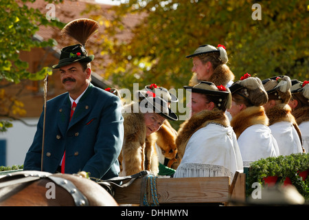 Leonhardiritt procession, horse-drawn carriage with women wearing traditional costume, Wildsteig, Pfaffenwinkel region Stock Photo