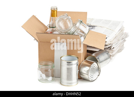 Collected glass bottles, tin cans and newspaper in carton box for recycling on white background Stock Photo
