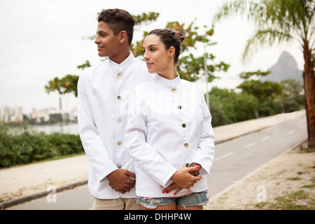 Portrait of young male and female service staff, Rio De Janiero Stock Photo