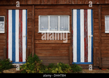 An old weathered beach hut at Steep Hill Cove on the Isle of Wight Stock Photo