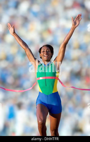 Runner at finish line Stock Photo