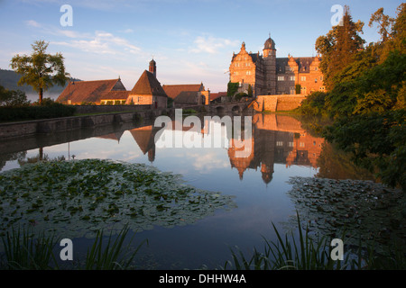 View over the pond onto Haemelschenburg castle, Emmerthal, Weser Hills, North Lower Saxony, Germany, Europe