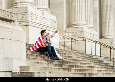 Couple with American flag Stock Photo