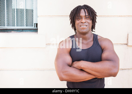 Portrait of mid adult man with arms crossed Stock Photo