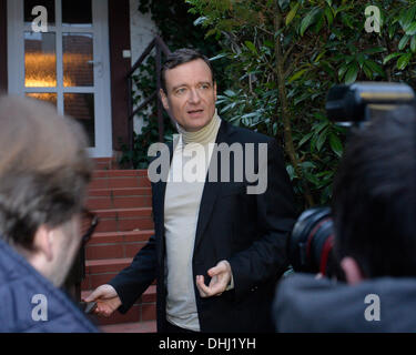 Hostivice, Czech Republic. 11th Nov, 2013. Former Social Democrat (CSSD) regional governor and ex-lawmaker David Rath speaks to journalists in front of his house in Hostivice near Prague on Monday, Nov. 11, 2013. The Prague High Court released him from custody where he spent 18 months. David Rath and ten other people are charged with corruption and manipulation of public tenders. (CTK Photo/Michal Dolezal) Stock Photo