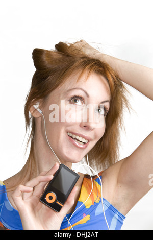 woman listens music Stock Photo