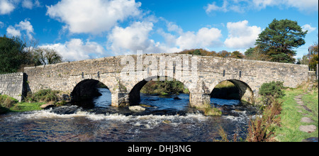 A granite bridge over the river Dart at Postbridge on Dartmoor National Park in Devon Stock Photo