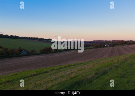 Late Summer evening in the Kent Countryside overlooking fallow fields Stock Photo