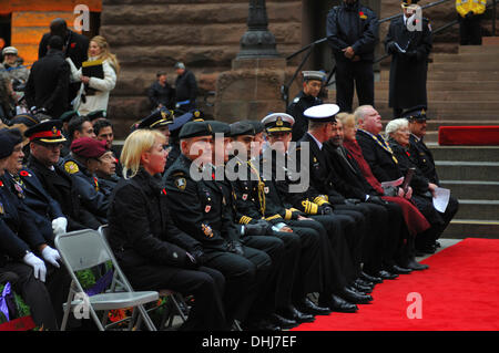 Toronto, Canada. 11th Nov, 2013. surrounded by dignitaries, amidst Torontonians of all stripes, Mayor Rob Ford delivers a commemorative speech on the steps of Toronto's Old City Hall, during Remembrance Day Ceremonies at Toronto, Ontario, Canada. Credit:  Gregory Holmgren/Alamy Live News Stock Photo