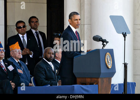 US President Barack Obama speaks at Arlington National Cemetery in honor of Veterans Day November 11, 2013 in Arlington, VA. Stock Photo