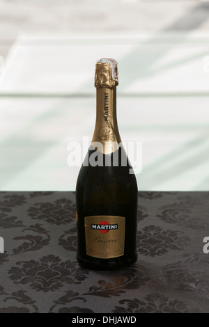 Martini Prosecco champagne wine white bottle table alcohol sunset full drink drinks drunk fun enjoy enjoyment brand full closed Stock Photo