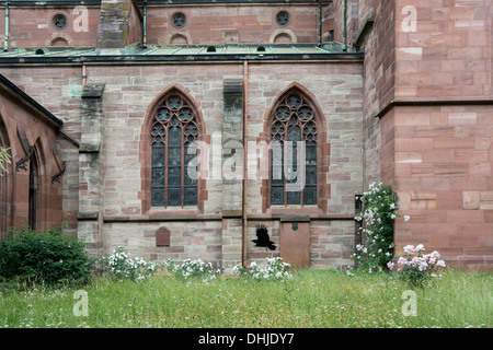 Stained glass windows of the Basel Munster seen from the Grosser Kreuzgang, Old Town Basel, Switzerland Stock Photo