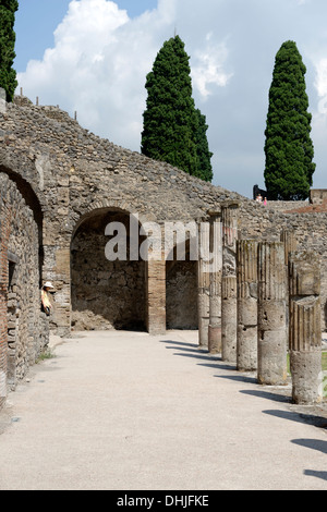 The Arcaded Court of the Gladiators at Pompeii Italy. During the time of Nero the court was transformed into a barracks for Glad Stock Photo