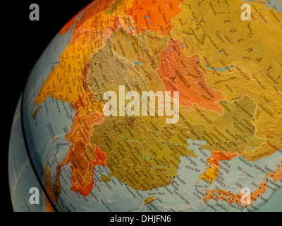 A view of China and the Far East on a beautiful, illuminated globe. Stock Photo