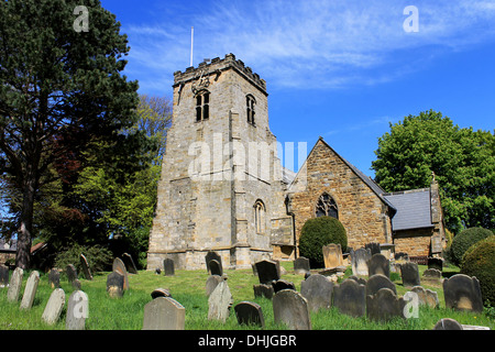 Scenic view of old village church with cemetery in foreground, England. Stock Photo