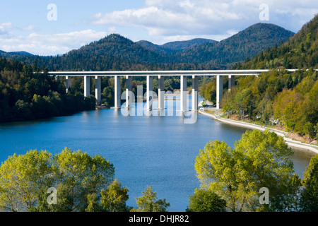 Highway viaduct over Bajer lake near Fuzine in Croatia Stock Photo