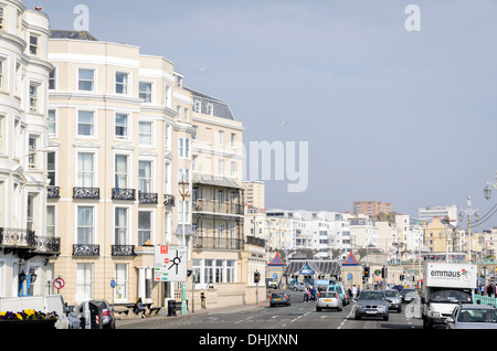 Light coloured Victorian-era hotels on the sea front; typical English seaside resort scene. Stock Photo