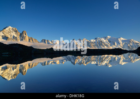Mont Blanc range reflecting in a mountain lake, Mont blanc range, Chamonix, Savoy, France Stock Photo